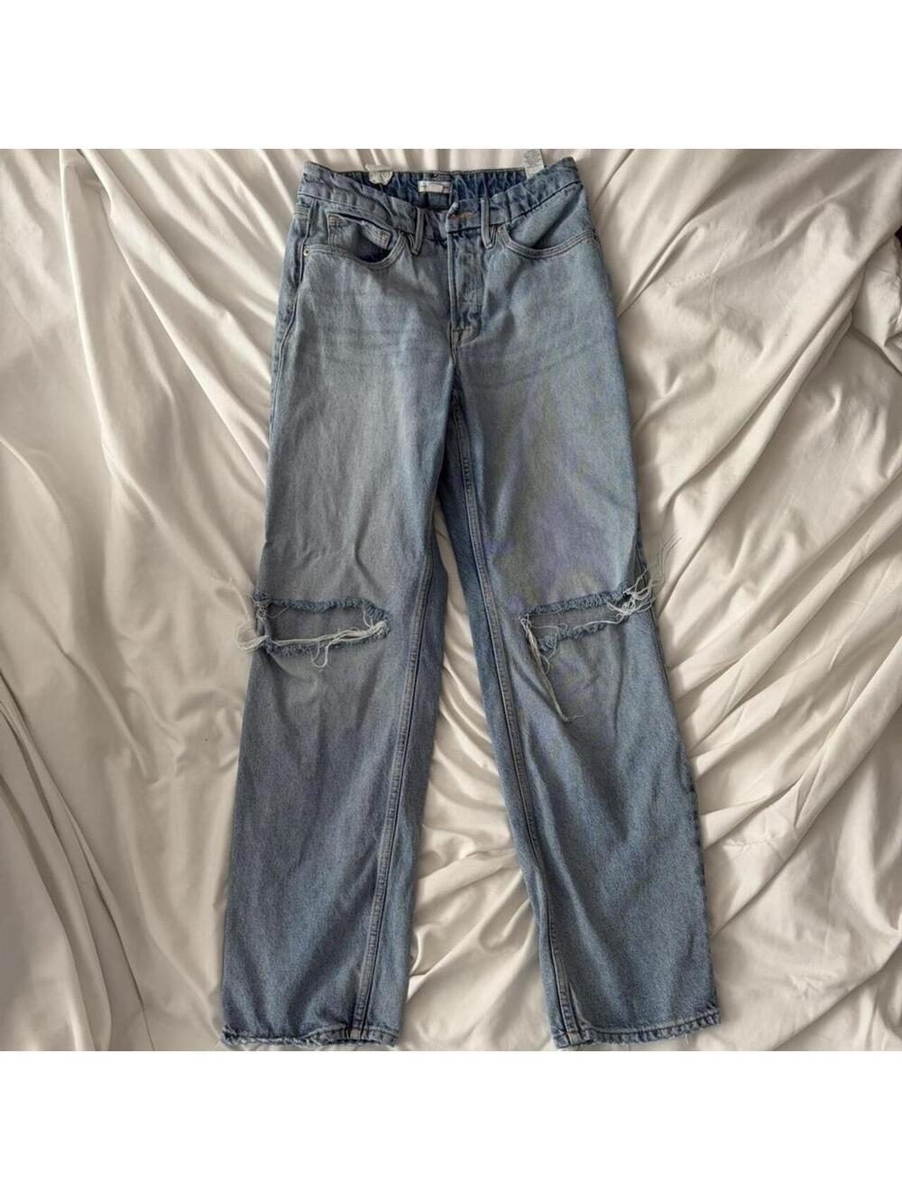 Good American light wash distressed jeans